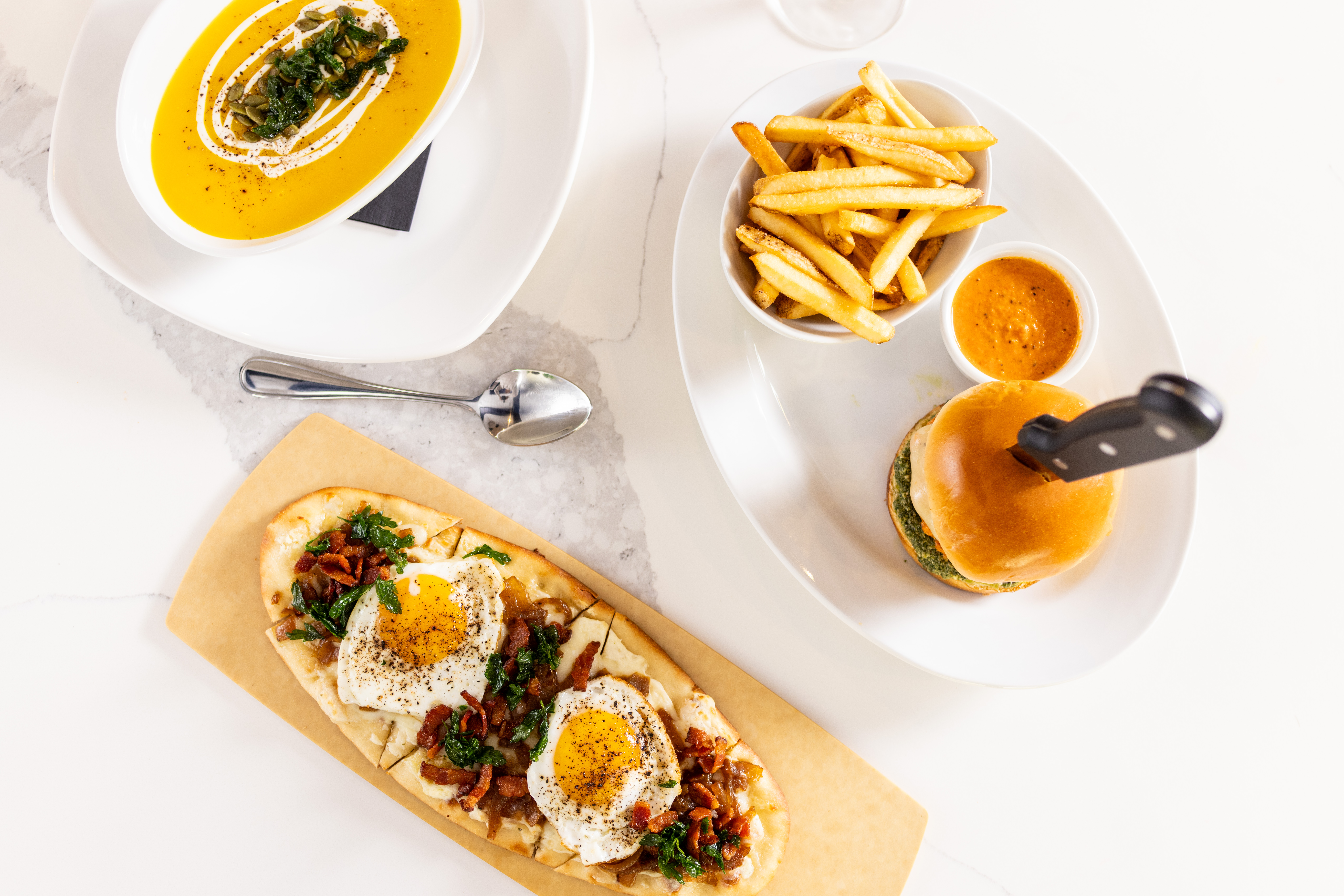 Sports and Social Fall Menu Food Items Including Roasted Butternut Squash, Carbonara Flatbread, and Wagyu Meatball Sandwich